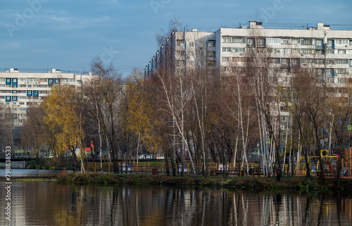 Multi-storey residential complex on the river bank in a residential area