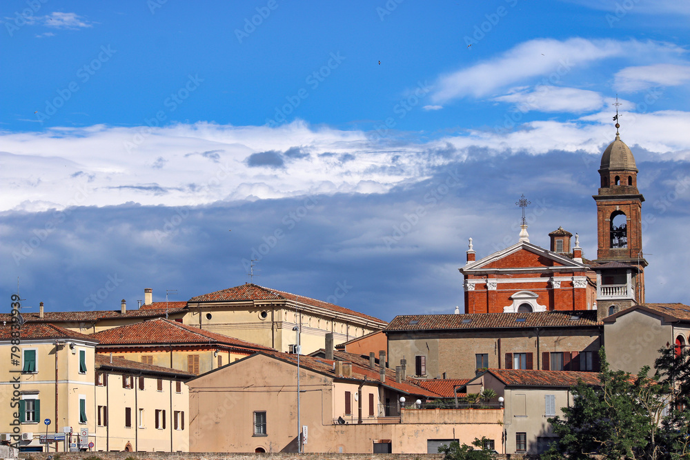 Old church and buildings cityscape in Rimini Italy