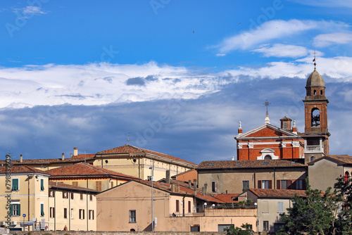 Old church and buildings cityscape in Rimini Italy