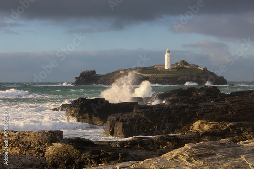lighthouse on the coast in rough seas