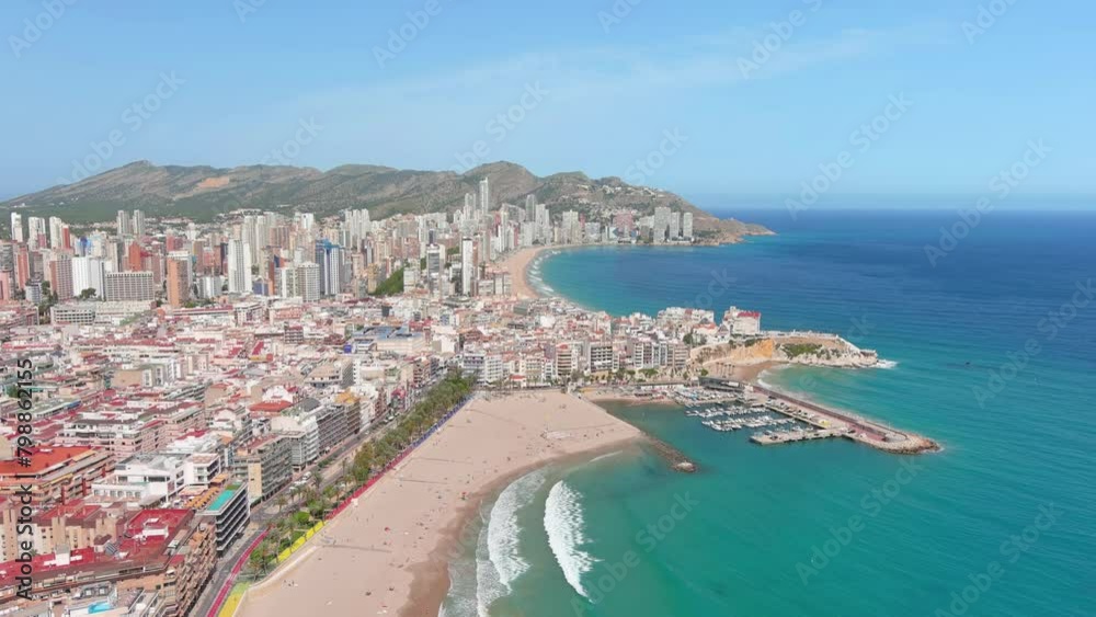 Benidorm, Spain: Aerial view of beach Playa de Poniente (West Beach) in famous summer tourist resort by Mediterranean Sea, summer day with blue sky - landscape panorama of Europe from above
Benidorm, Spain: Aerial view of beach Playa de Poniente (West Beach) in famous summer tourist resort by Mediterranean Sea, summer day with blue sky - landscape panorama of Europe from above