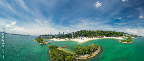 Fototapeta Naklejka Na Ścianę i Meble -  Sentosa Beach, Singapore. Aerial view of beach and coastline on a sunny day