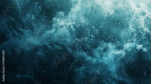 The image is a blue and white swirl of water with a blue and white background. The water appears to be in motion, creating a sense of movement and energy