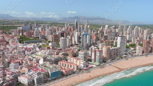 Benidorm, Spain: Aerial view of beach Playa de Levante (Platja de Llevant) in famous summer tourist resort by Mediterranean Sea, summer day with blue sky - landscape panorama of Europe from above
 photo