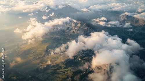 Cloud covered mountains seen from above © 2rogan