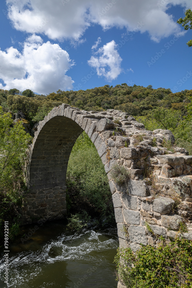 View of the remains of the medieval Roman bridge of Alcanzorla, on the Guadarrama river, Galapagar, Community of Madrid.