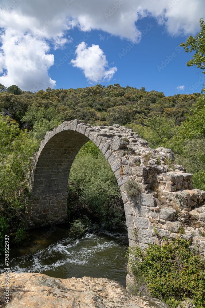 View of the remains of the medieval Roman bridge of Alcanzorla, on the Guadarrama river, Galapagar, Community of Madrid.