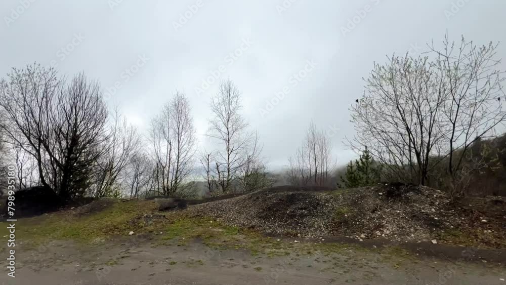 Ceylomsky pass from a car window in Ingushetia. A trip uphill to the Tsei Loam pass on a cloudy spring day. Panorama of the high cliffs of the Dzheyrakh gorge. North Caucasus, Russia. 4K Ceylomsky pass from a car window in Ingushetia. A trip uphill to the Tsei Loam pass on a cloudy spring day. Panorama of the high cliffs of the Dzheyrakh gorge. North Caucasus, Russia. 4K