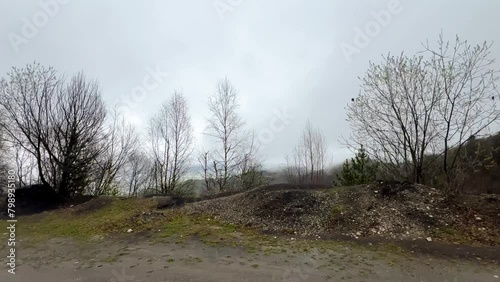 Wallpaper Mural Ceylomsky pass from a car window in Ingushetia. A trip uphill to the Tsei Loam pass on a cloudy spring day. Panorama of the high cliffs of the Dzheyrakh gorge. North Caucasus, Russia. 4K Torontodigital.ca