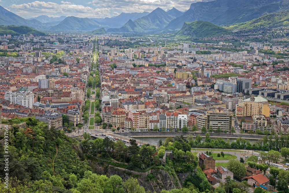 Fototapeta premium General view of the city of Grenoble from La Bastille hill and fortress with Vercors slopes in the background