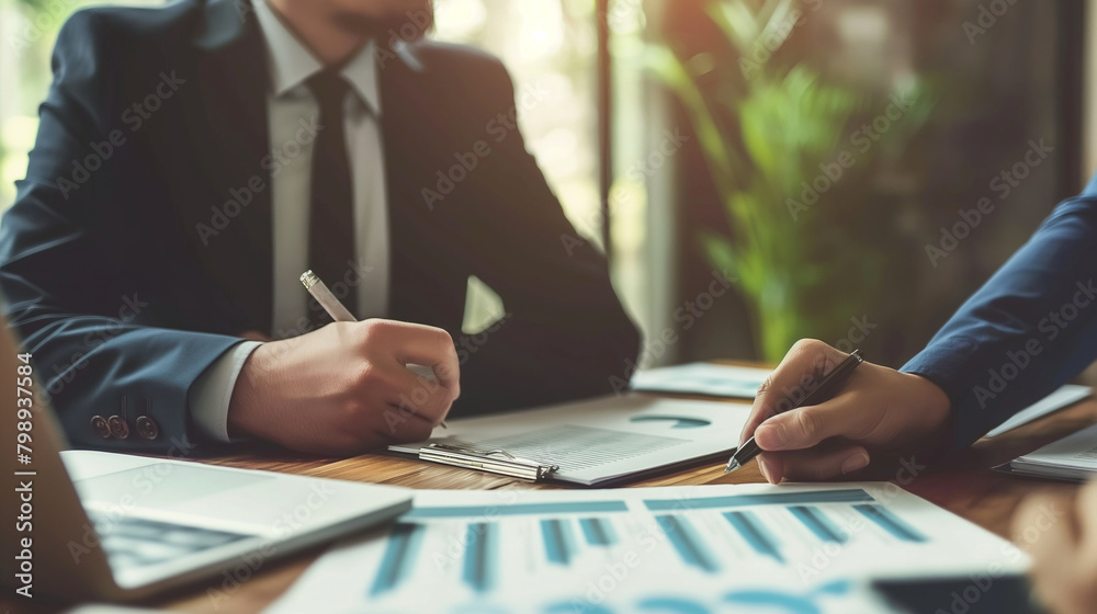 A business consultant advising a client on strategic planning and growth opportunities. Diligence and work, team and trust, profit A business consultant advising a client on strategic planning and growth opportunities. Diligence and work, team and trust, profit