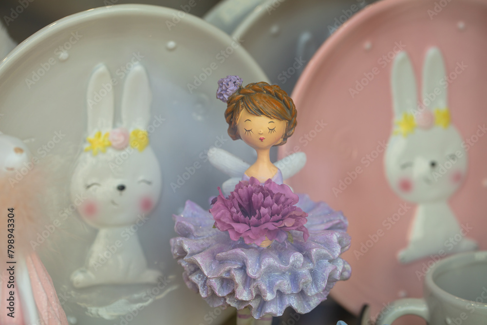 decorative toy girl figurine in shop window decorative toy girl figurine in shop window