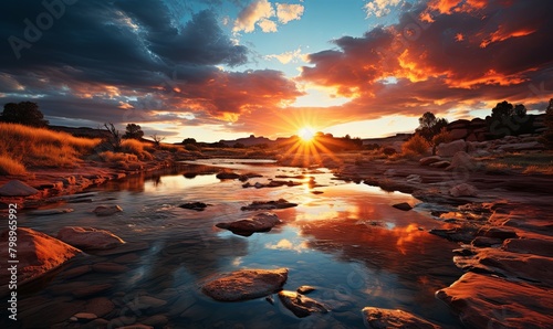 Sun Setting Over River With Rocks photo