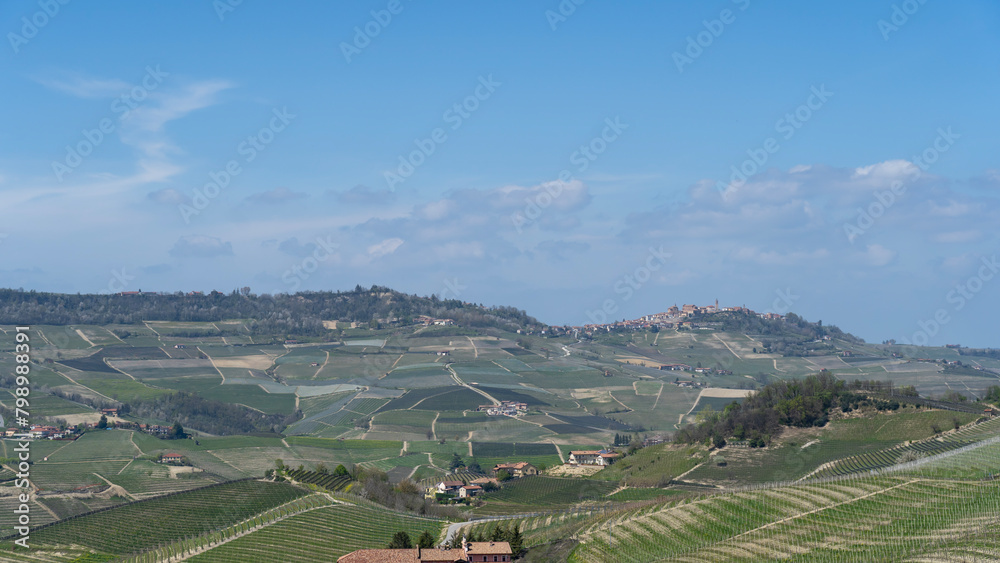 Amazing landscape of the vineyards of Langhe in Piemonte in Italy during spring time. The wine route. An Unesco World Heritage. Natural contest. Rows of vineyards