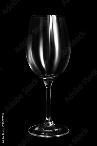 Empty wineglass on black