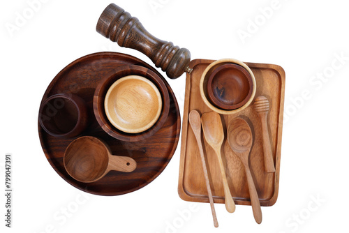 Kitchen utensils, spoons, forks, wooden cups on white background. 