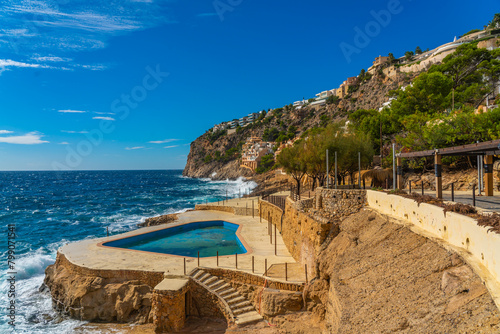 Port Andratx landscape with a public pool houses on Mallorca island