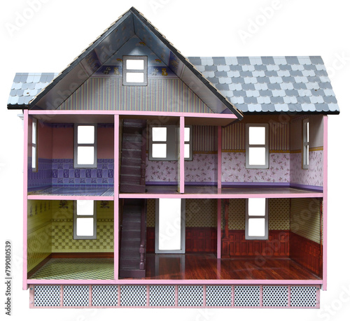 open front elevation showing the interior of an empty colorful dolls house complete with attic room and pitch tiled roof isolated on a transparent background