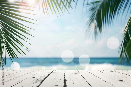 A wooden table on a tropical beach with palm trees and ocean in the background.