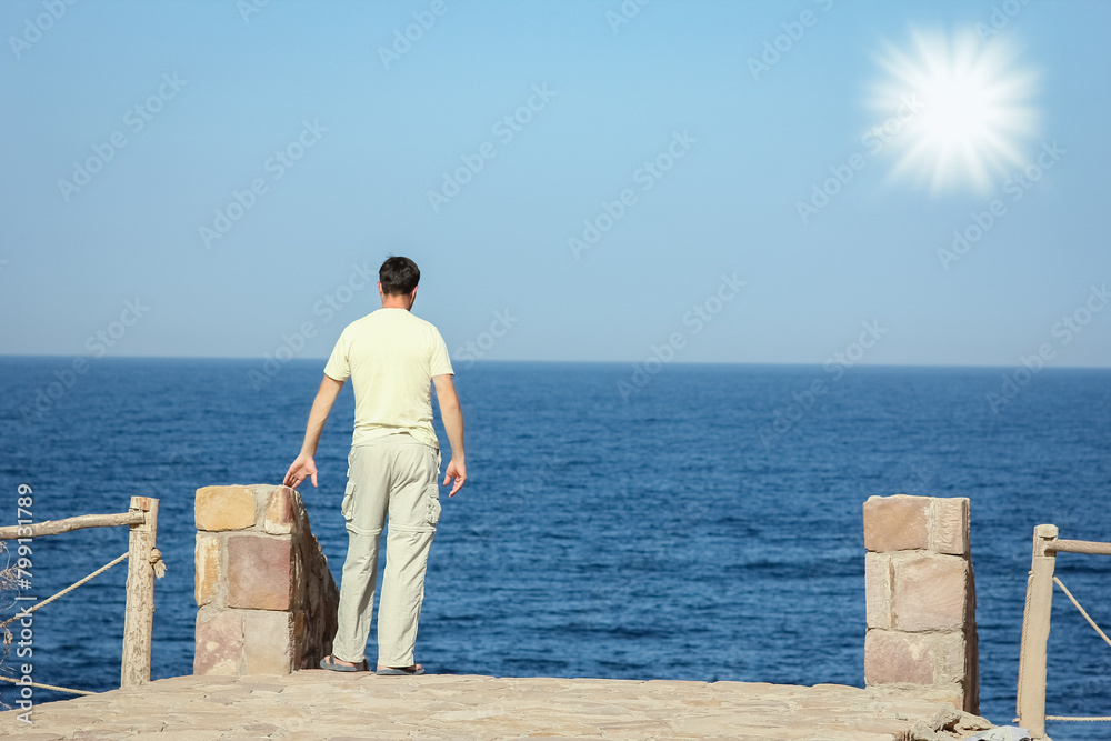 Happy guy on the sea background Happy guy on the sea background