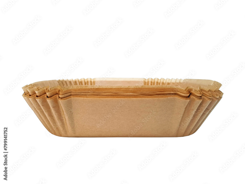 Stack of disposable wax paper for your fryer isolated on white background with clipping path. Air fryer paper liner, front view close up. Stack of disposable wax paper for your fryer isolated on white background with clipping path. Air fryer paper liner, front view close up.