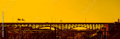 Bridge over Cuyahoga river in Cleveland (OH) USA, at sunset. Panoramic image. photo