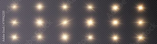The golden light of the star shines and sparkles on a transparent background. Vector isolated set of sun glow and starlight icons with lens flare effect.	