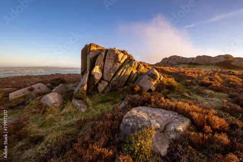 Golden hour sunrise at The Roaches in the Staffordshire Peak District National Park, England, UK. photo