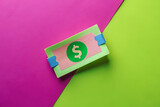 Savings Representation by Single Clipped Coupon on Lime and Magenta