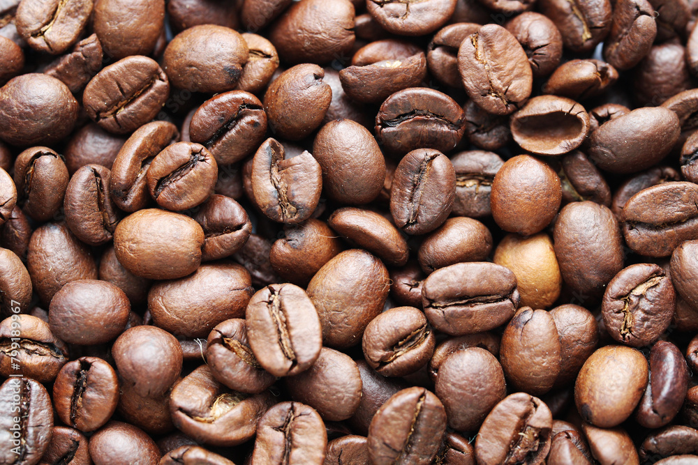 Fototapeta premium Roasted coffee beans close up background