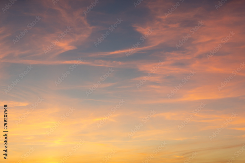 Real amazing panoramic sunrise or sunset sky with gentle colorful clouds.