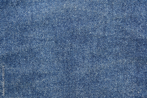 Blue jean texture. Blank denim cloth textile background. Soft fabric. Flat cotton surface. Grunge structure design. Dark navy material. Indigo vintage style. Copyspace