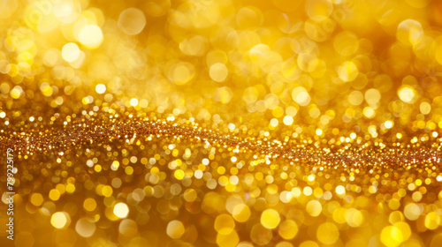 Abstract shimmering golden bokeh lights for festive or luxury backdrop © Michael