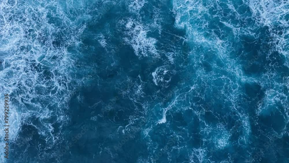 Beautiful texture of big power ocean waves with white foam. Aerial top view footage of fabulous sea tide on a stormy day Beautiful texture of big power ocean waves with white foam. Aerial top view footage of fabulous sea tide on a stormy day