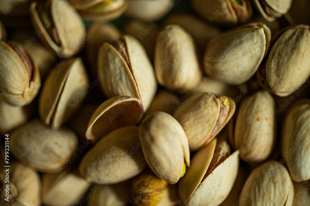 Pistachio nuts. Many pistachios in a pile. Pistachio nuts. Many pistachios in a pile.