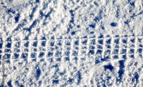 motorcycle tracks in the fresh snow