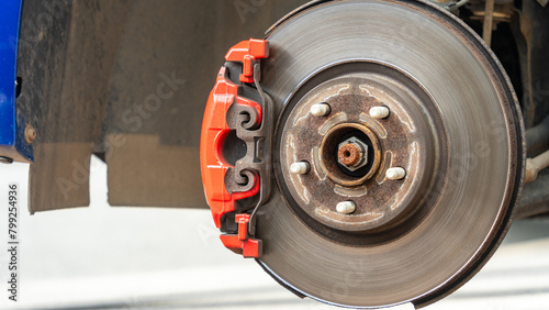 Photos Close-up of a red sports brake caliper