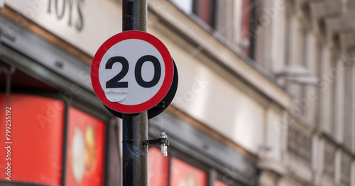 20mph speed sign in urban setting	
 photo