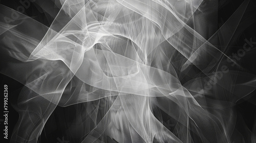 Elegant black and white image of smooth, flowing silk textures