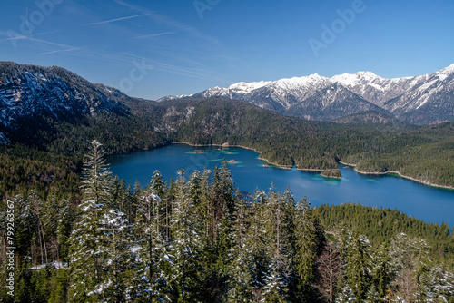Fototapeta Naklejka Na Ścianę i Meble -  lake in the snow  mountainous region near the Alps in early spring 
