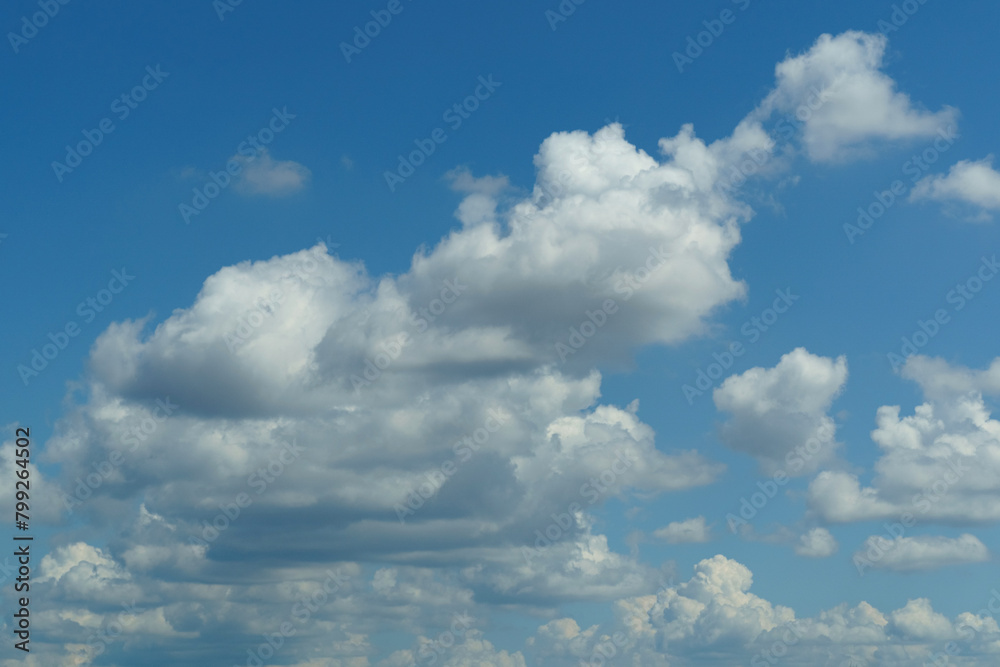 Plane Flies Through Cloudy Sky