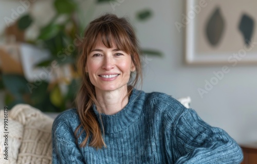 Serene Bliss: Happy Woman in Blue Sweater Enjoying Peaceful Moment at Home