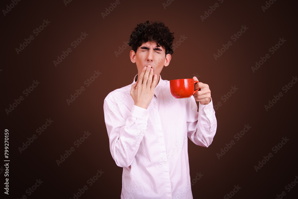 Funny emotional student posing in studio against color background. Funny emotional student posing in studio against color background.