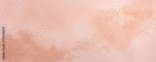 Tan pale pink colored low contrast concrete textured background with roughness and irregularities pattern with copy space for product design or text 