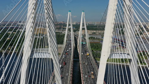 Cable-stayed bridge with cars photo