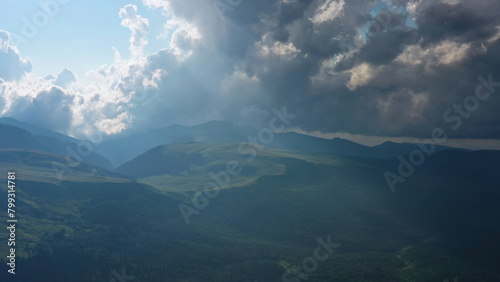 Mountain landscape with sun rays