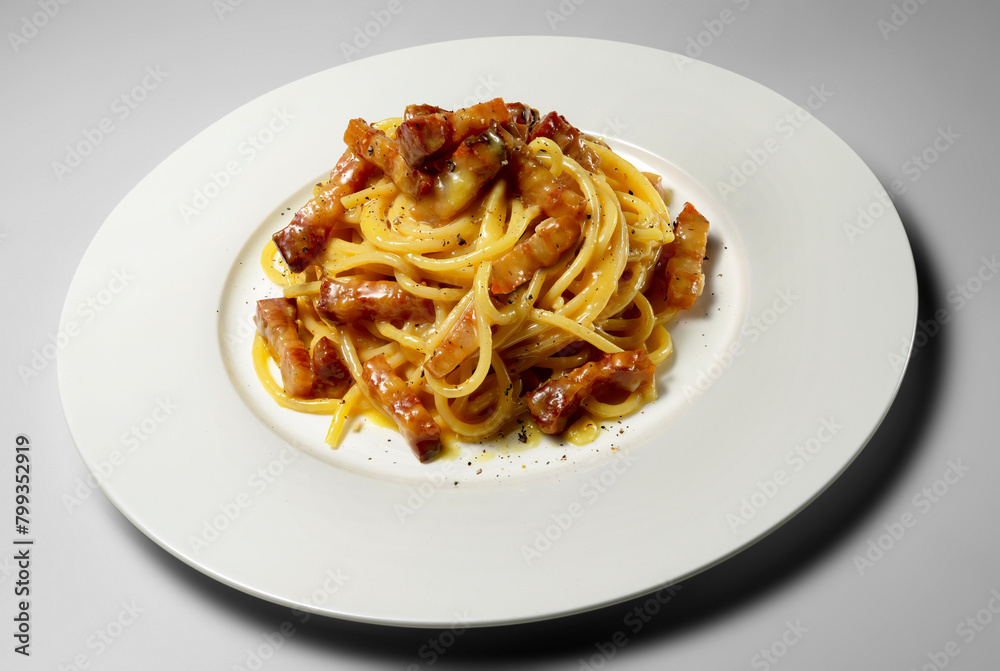 Typical Italian pasta dish Spaghetti carbonara isolated on white background