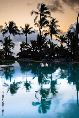 Pretty swimming pool at sunrise in a large hotel in Punta Cana in the Dominican Republic