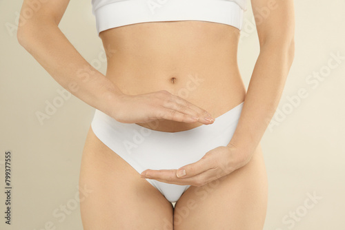 Gynecology. Woman in underwear on light background, closeup