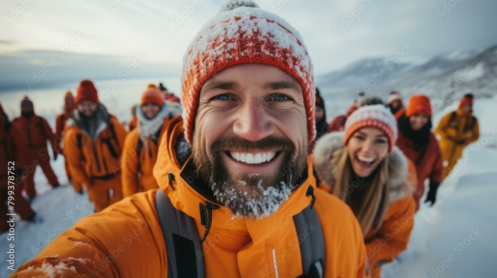 Group of happy hikers in the snowy mountains taking a selfie Group of happy hikers in the snowy mountains taking a selfie